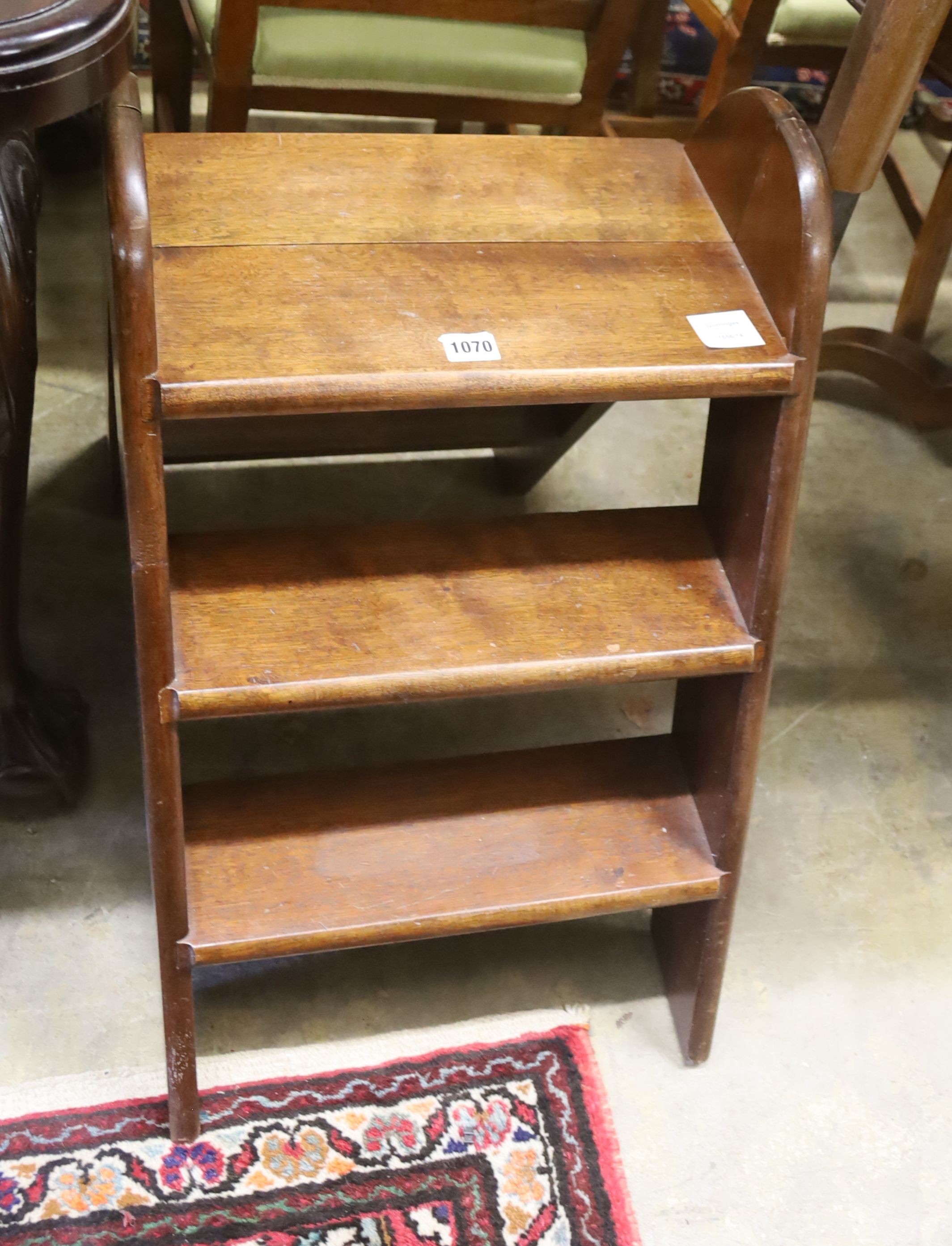 A set of Victorian style mahogany three tread folding library steps, width 42cm, height 114cm